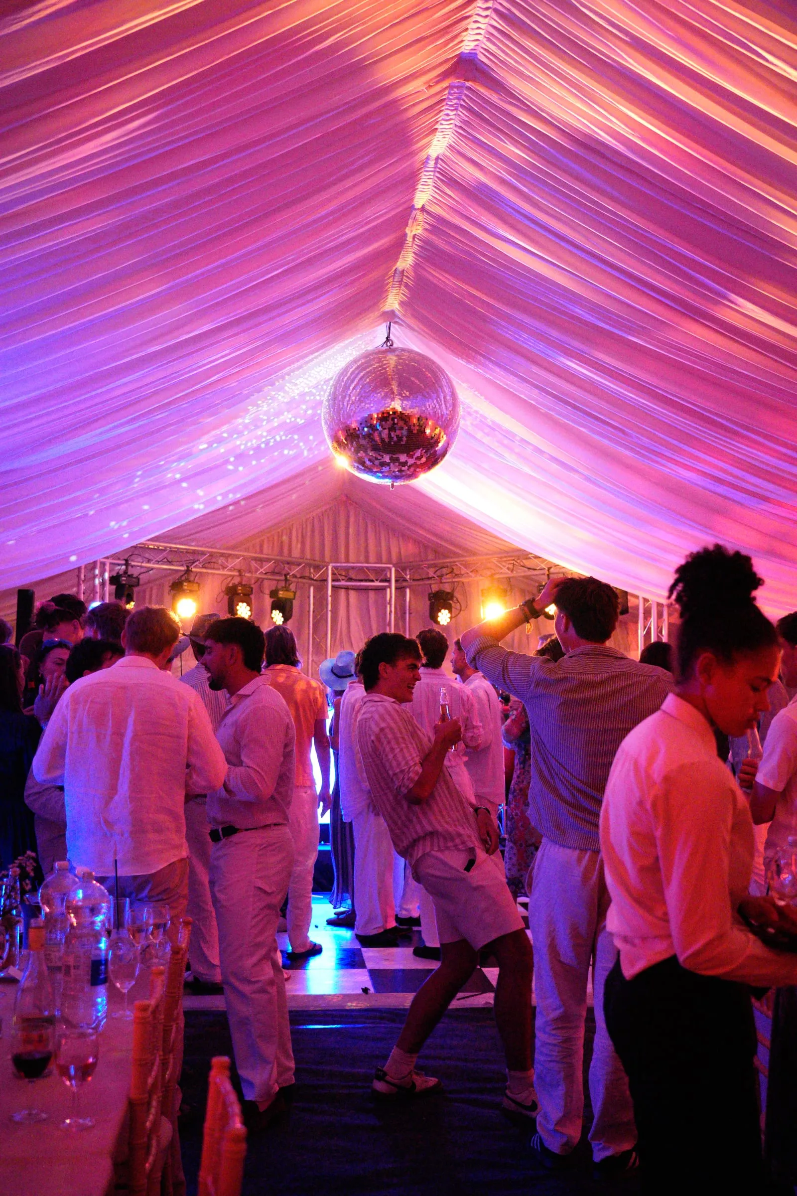 The marquee from the dance floor, a mirror ball hanging from its peak.